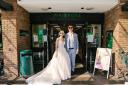 Jessica and Jaxom Weston-Brown took wedding photos at the Waitrose where they met