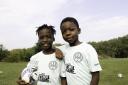 Young Hackney Wick FC members wearing the 'It's not a game' top to raise awareness of prostate cancer