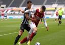 Newcastle United's Jacob Murphy (left) and Arsenal's Gabriel Martinelli battle for the ball during the Premier League match at St James' Park, Newcastle upon Tyne. Issue date: Sunday May 2, 2021.