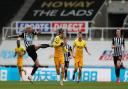 Newcastle United's Jonjo Shelvey and Tottenham Hotspur's Gareth Bale battle for the ball during the Premier League match at St James' Park, Newcastle. Picture date: Sunday April 4, 2021.