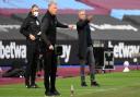 Tottenham Hotspur manager Jose Mourinho (right) gestures on the touchline during the Premier League match at the London Stadium, London. Picture date: Sunday February 21, 2021.