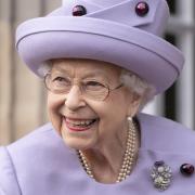 Queen Elizabeth II attends an armed forces act of loyalty parade in the gardens of the Palace of Holyroodhouse, Edinburgh, as they mark her platinum jubilee in Scotland on Tuesday June 28, 2022