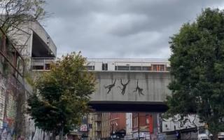 The artwork appeared over Brick Lane yesterday (August 7)