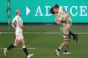 England's Owen Farrell (right) celebrates scoring his side's winning penalty kick in extra time with team-mates Tom Curry and Dan Robson (left) during the Autumn Nations Cup match at Twickenham Stadium