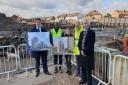 Staff from Wates Residential join Neil Stubbings (right, end) and Izzy at the Napier New Plymouth site. Picture: Havering Council