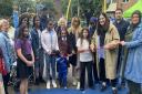 Councillors join families to cut ribbon for the new children's play area on the Love Lane Estate in Tottenham