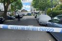 Police cordon in Russell Gardens Mews