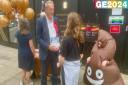 A volunteer dressed as a poo emoji joined Labour's North West Norfolk candidate in King's Lynn