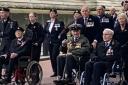 Naval veteran Kenneth MacNaughton talking part in the Cenotaph march past