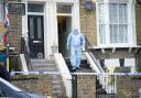 Forensics at the scene of Montague Road in Hackney