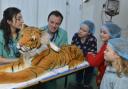 Children 'on shift' practising to be zoo vets