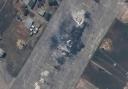 A destroyed MiG 31 fighter aircraft at Belbek air base, near Sevastopol, in Crimea (Satellite image ©2024 Maxar Technologies via AP)