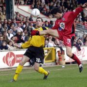 Leyton Orient's Matthew Brazier (right) challenges Rushden & Diamond rival David Bell for the ball (pic: Chris Young/PA Images).