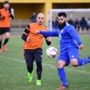 Action from the Essex Senior League derby between Tower Hamlets (orange) and Sporting Bengal United (blue) last season (pic: Tim Edwards).