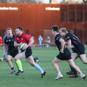 Singer Richard Hadfield (red shirt) plays for Old Streetonians Rugby based at Hackney Marshes