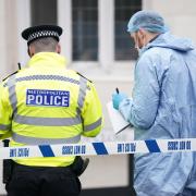 A police cordon is in place in Hackney Wick after two men were stabbed earlier today