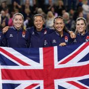 Great Britain pose with the Union Jack flag after beating Sweden in the Billie Jean King Cup play-off at the Copper Box Arena. Image: PA