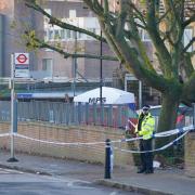 Police at the scene of the shooting this morning (December 6)