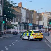 Stoke Newington Church Street has been shut by police