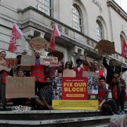 Members of the community union ACORN protest at Hackney Town Hall