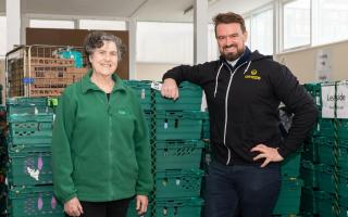 Pat Fitzsimons Hackney Foodbank CEO (left) and Omaze's James Oakes