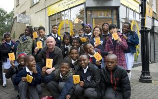 Nick Hornby with young writers he supported at Ministry Of Stories in Hoxton